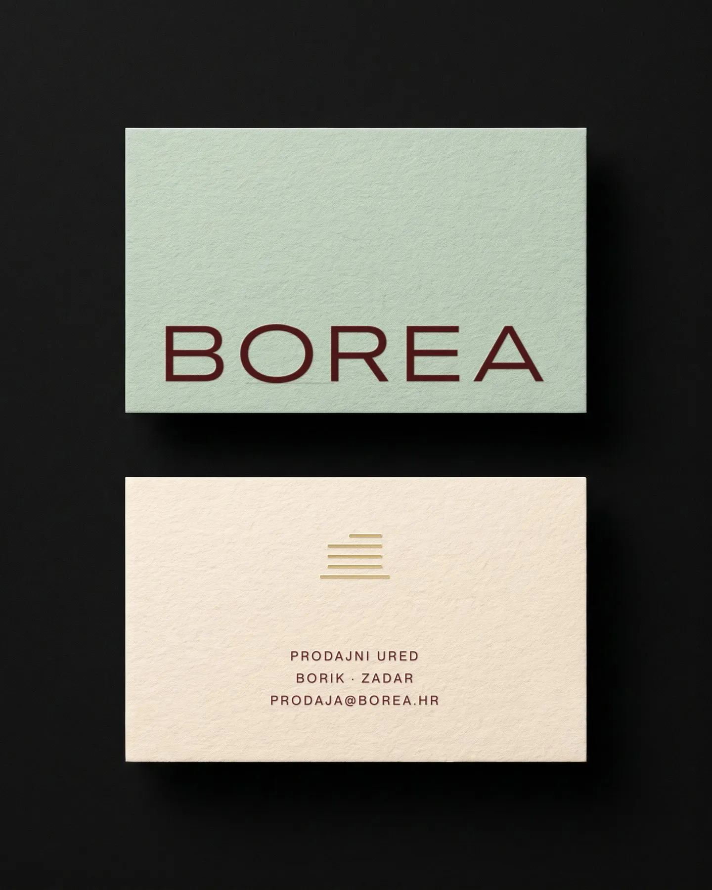 Letterpress business cards and the flag on the facade.