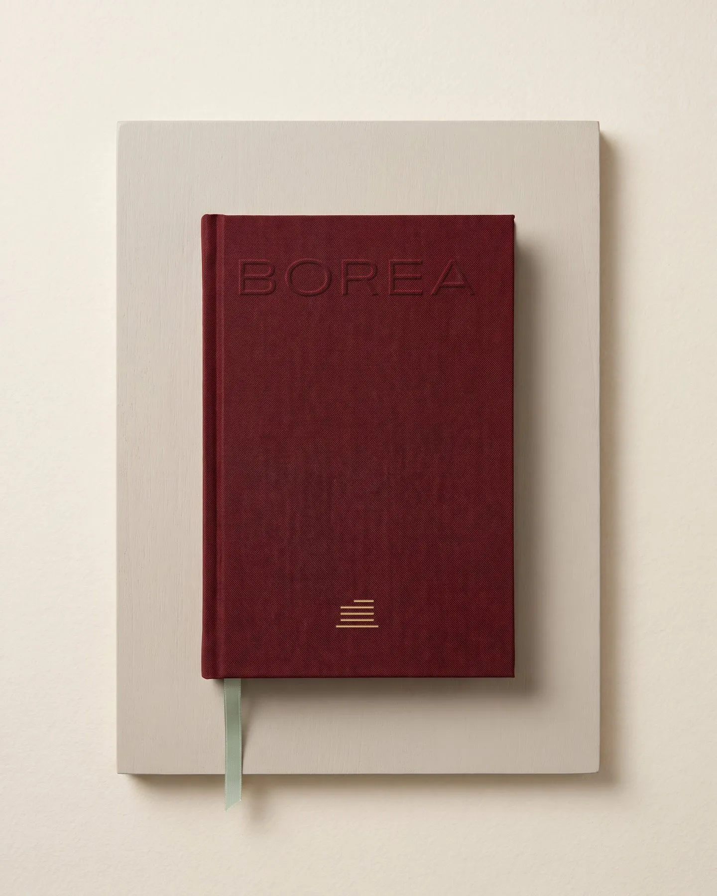 The catalogue cover with blind embossing, and the key box for new owners.